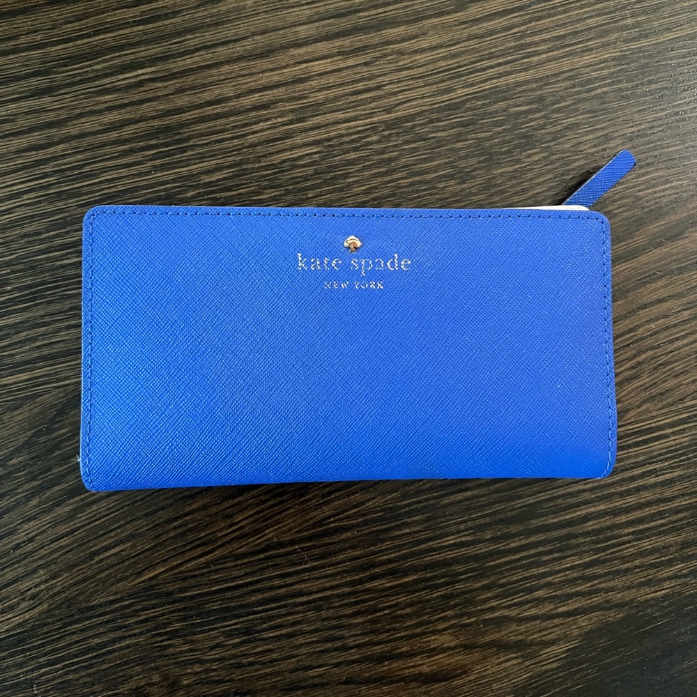 Bright blue Kate Spade slim bifold wallet